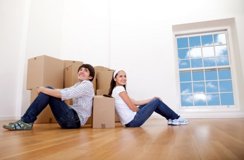 Packed boxes and furniture ready for a residential move in Cranford