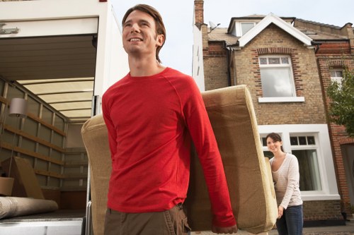 Local movers handling boxes and household furniture in Cranford