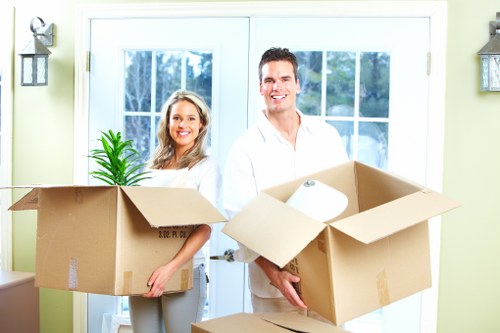 Local team collecting a sofa and chairs from a residential property in Cranford