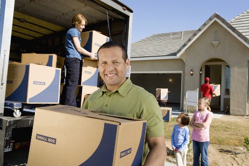 Secure loading of items into a removal van with protective padding