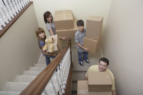 Local moving team handling boxes and furniture in Cranford